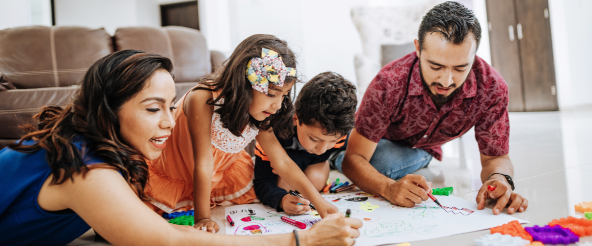transformative parenting stories depicted by this beautiful family creatively drawing together