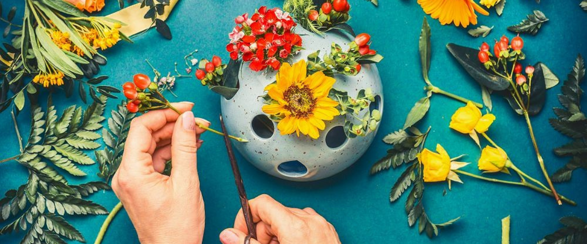 Hands arranging flowers creative hands-on practice Feeling spiritual gift empath energy